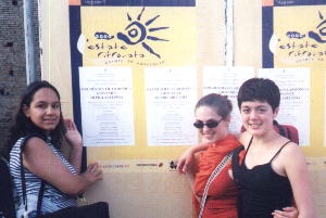 Celina, Laura, & me with a poster of our Reggio Emilia concert